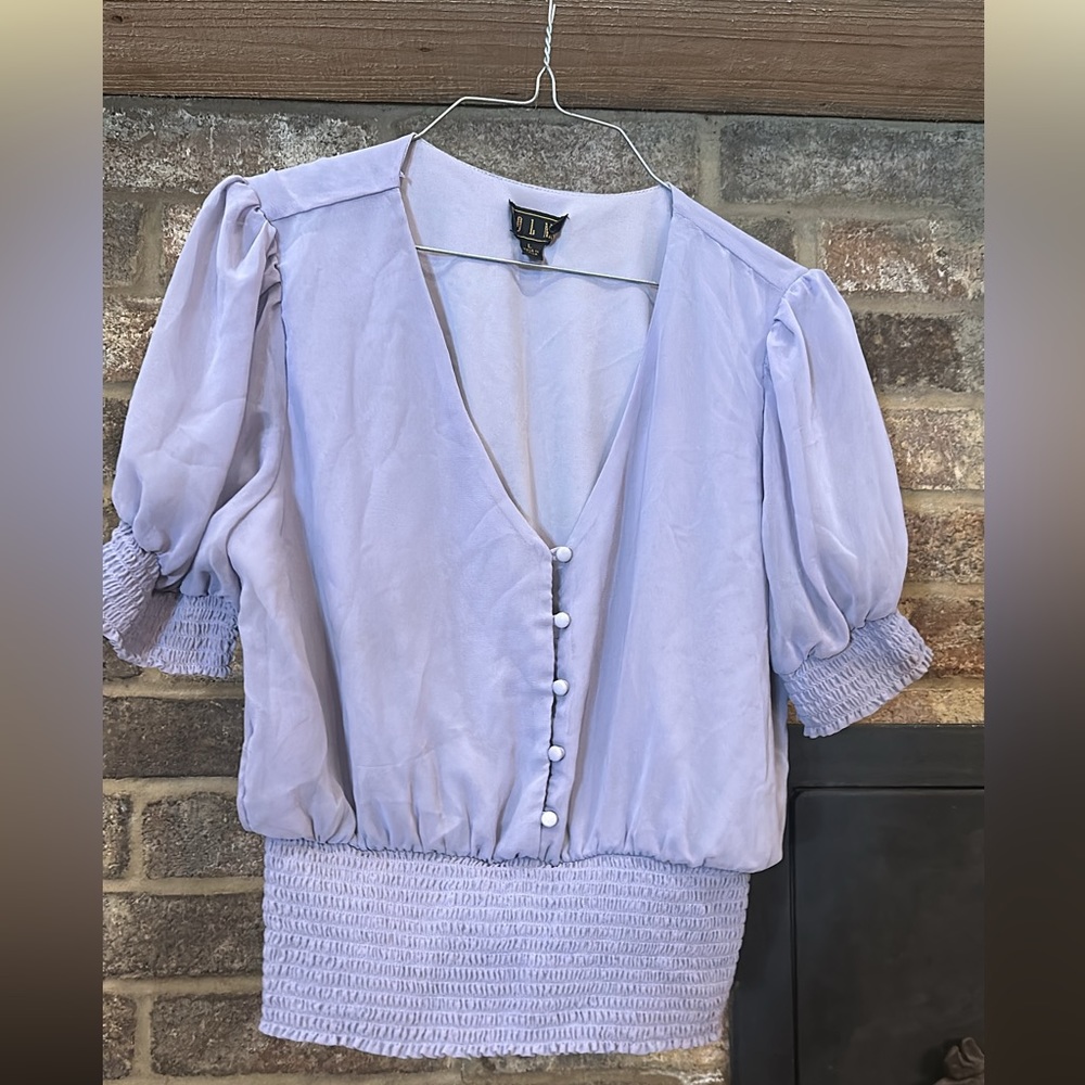 Size Large top from Francesca’s bought from the Branson landing on a vacation